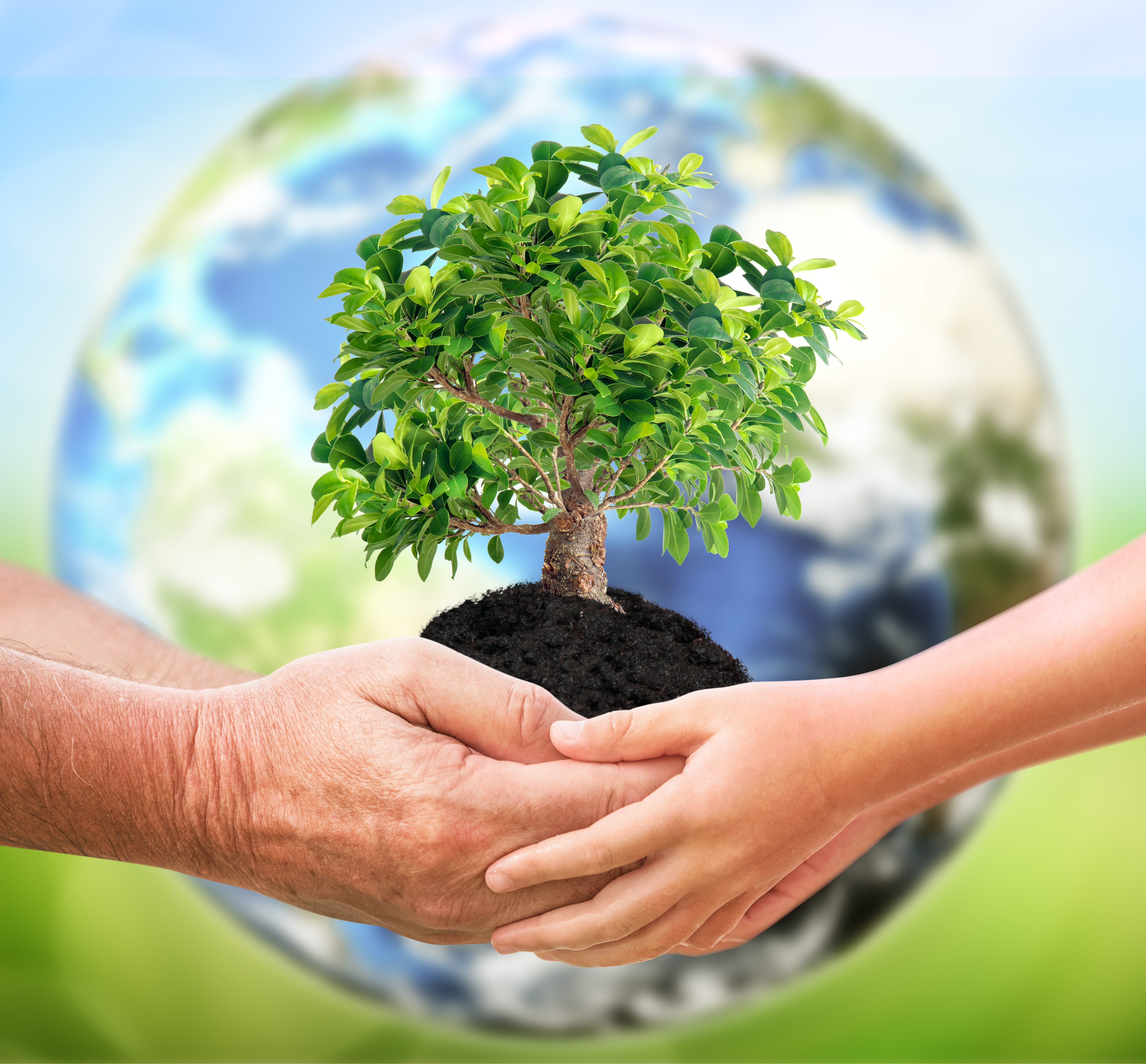 The man holding a tree with baby over planet Earth background.